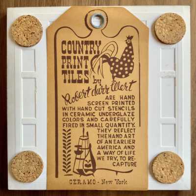 Tile back with Country Print Tiles branding.