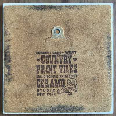 Tile back with Country Print Tiles branding.