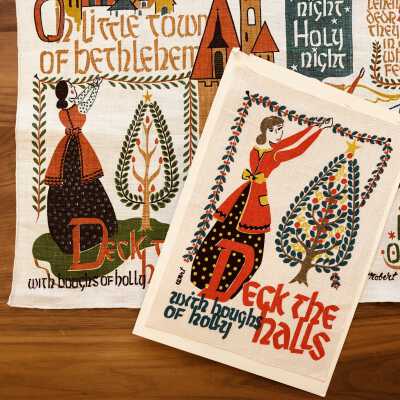 “Deck the Halls” Gift Greeting alongside Christmas Songs 221 towel//wallhanging; see “Gift Greetings”.: PKM collection.