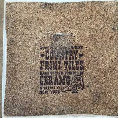 Back of tile with Country Print Tiles branding.