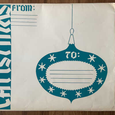 Blue and white Country Prints/Merry Christmas shipping envelope; see “Branding”.