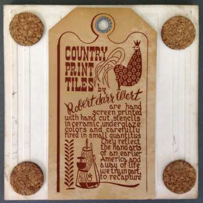 Tile back with Country Print Tiles label hanger and cork pads.