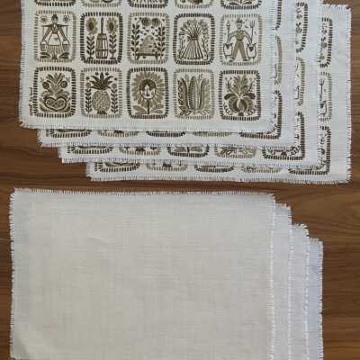 Placemats and napkins, four of each.: PKM collection.