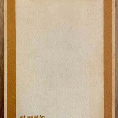 Card face with linen print lifted, patent notice visible.