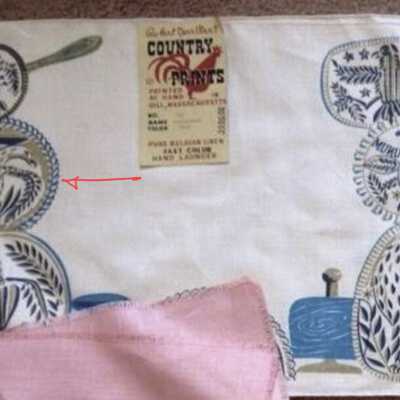 Eagle buttermold, reversed, on a Country Prints placemat, Buttermold 113 in blue.: Image: Worthpoint.com