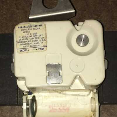 Battery operated clockworks.: Clock model number is omitted from adhesive tag.