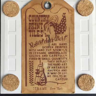 Tile back with Country Print Tiles label hanger and cork pads.