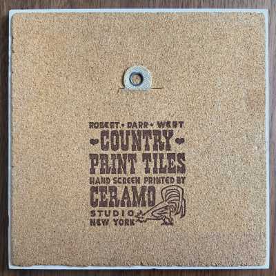 Tile back with Country Print Tiles branding.