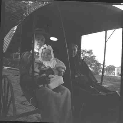 Nellie and baby Theodore in carriage