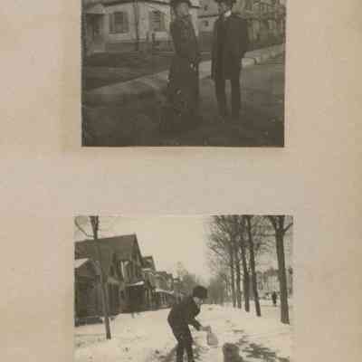 William Karslake and Grace Gookin, standing in front of a row of houses; yo