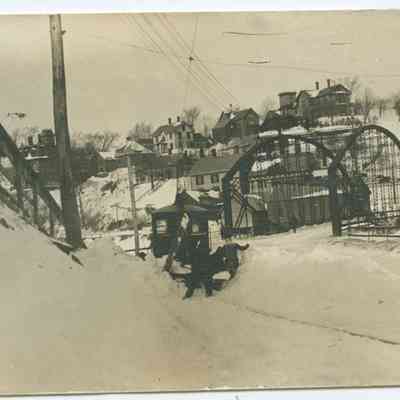Old iron bridge across the Goose River in winter