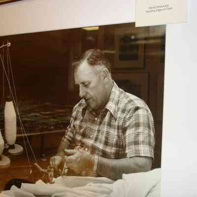 Harold Drinkwater stitching cloth, Knox Mill: Copyright: None; Origformat: Print-Photographic