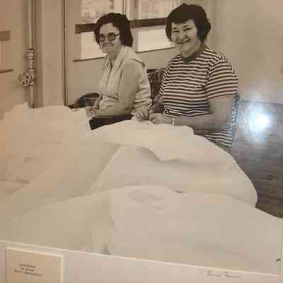 Annie Basford & Fay Secotte, burlers in the Burling Room at the Knox Mill, Camden