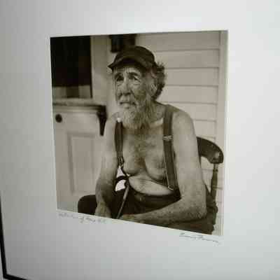 Walter Howe seated in a chair at his home on Howe Hill