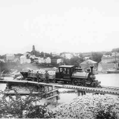 Quarry train unloading limestone at Rockport harbor kilns
