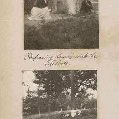 "Preparing lunch with the Talbots." Four people resting under a tree