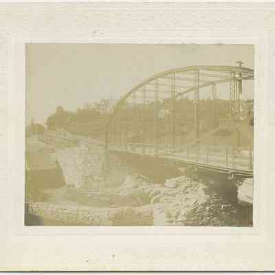 Trolley crossing the old iron bridge in Rockport