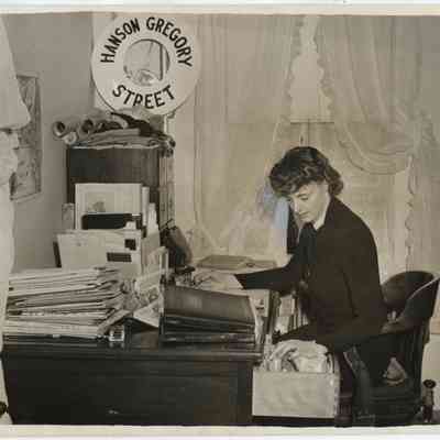 Betty Foxwell at her desk at the Camden Chamber of Commerce: Origsize: 8x10; Origformat: Print-Photographic; Resolution: 300 dpi