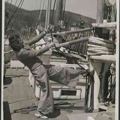 Betty Foxwell raising the sails circa 1941