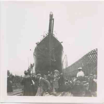 George W. Wells on the ways with crowd