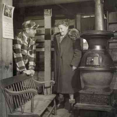 Ida Barrows and Carleton Ripley in Ewell's Store, Rockport