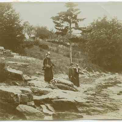People on shore of Rockport Harbor