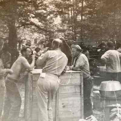 ND Natl. Guard Company L soldiers in an outdoor kitchen while training at Camp Claiborne, LA, Summer of 1941