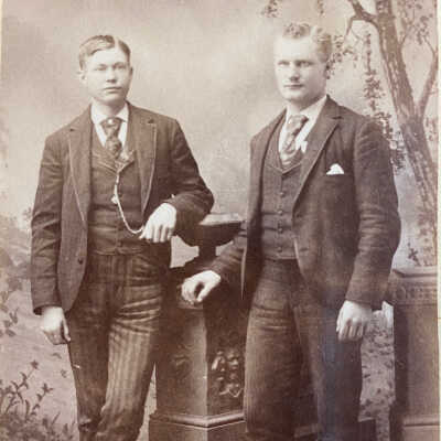 “Ole Hovet” written on back: likely Ole John Hovet (at right), son of Ole O. and Jacobine Hovet of rural Buxton