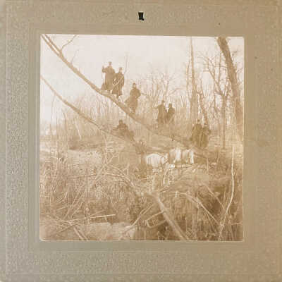 Unknown Nine Men by a Fallen Tree