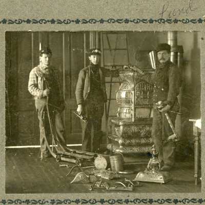 Unknown Trio by Pot Bellied Stove