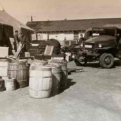 Supplies by the ND Natl. Guard Company L Mess Hall at WWII Camp Claiborne, LA -- Photo dated 1941.