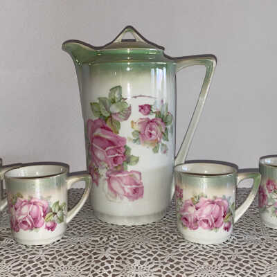 Tea Set: decorative pot and four cups