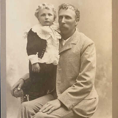 Unknown Man & Child, taken Penaas Studio, Decorah, IA