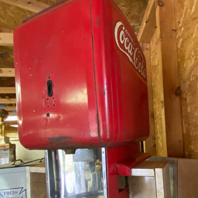 Red Metal Coke Dispenser
