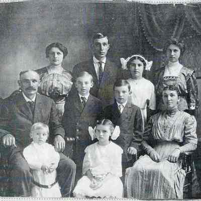 Family photo: Phillip & Dorothea (Rediske) Bohnsack and children: Back row (l-r): Laura, John Charles (J.C.), Nora & Marie
Middle row (l-r): Phillip, George, Walt & Dorothea
Front row (l-r): Erwin & Ruth
