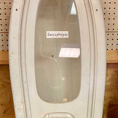 Child's coffin with glass window