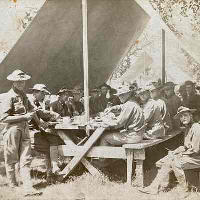 Traill County, ND, National Guard Company L under tent at Camp McCoy, Sparta, WI. Postcard dated 26 August 1911.