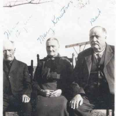 Ole Baglien (labelled "Dad", at right in the photo, as contributed by Minnie Baglien): At center, Ole's older sister Mary (Baglien) Knutson, and at left their father Hans Baglien