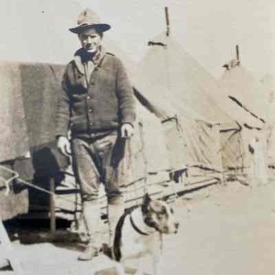 Soldier with Dog: a photo from Nelmer Talmo, bicycle repair shop operator in Hillsboro in the early 1900s