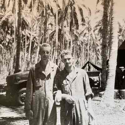 ND Natl. Guard, Company L soldiers by a WWII field kitchen on Guadalcanal, Soloman Islands, South Pacific
