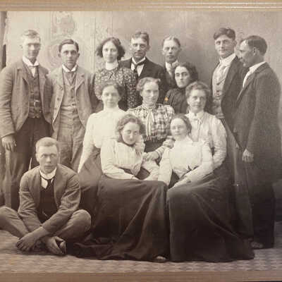 Group of 14 young men and women - back says from Buxton