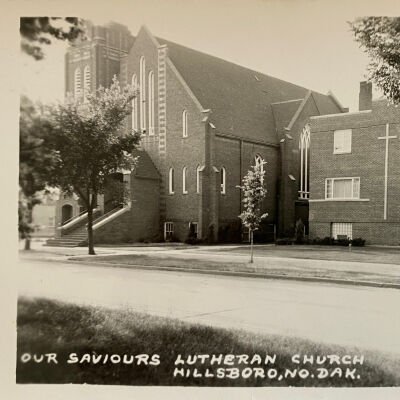 Our Savior's Lutheran Church, Hillsboro, ND. Postcard image showing 1958 addition of a parish education building at right.