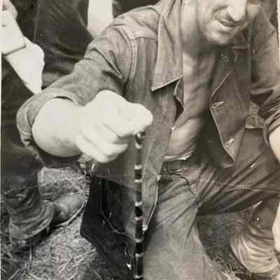 Soldier holding Coral Snake