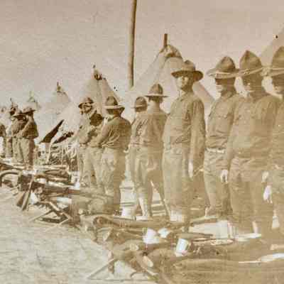 Soldiers lined up for inspection: a photo from Nelmer Talmo, bicycle repair shop operator in Hillsboro in the early 1900s