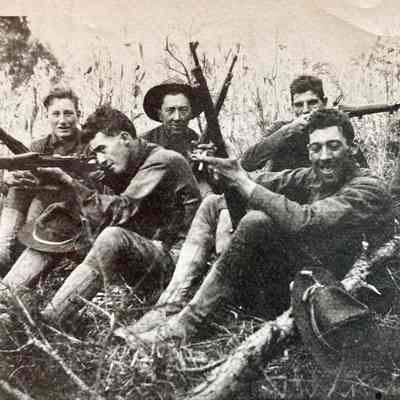 Military Men holding guns
