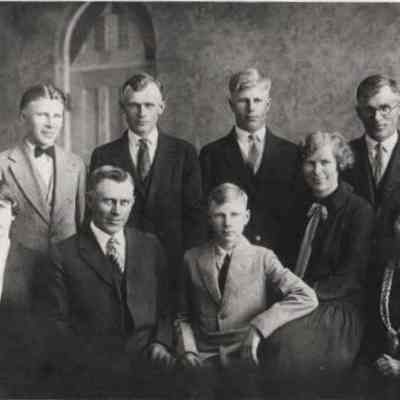 Family photo, of Ole T. and Anna (Jermeland) Hovet's nine surviving children: Front, l-r: Bertha, Thor, Milfred, Olina, & Ingeborg; Back, l-r: Selmer, Palmer, Edwin & Alfred