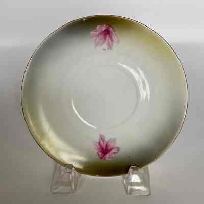 Cup and Saucer - Donated by Laura (Mrs. Clifford) Gunderson