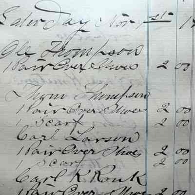 Belmont, ND, Ray General Store, account book record of purchases: Ole Thompson and son Thom Thompson buy Over shoes, etc.