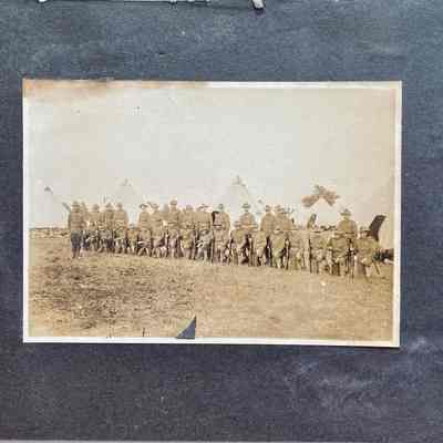 Infantrymen in uniforms holding guns