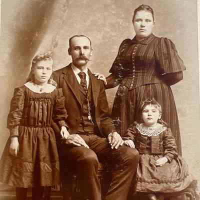 Family photo: William and Minnie Bohnsack with daughters Alvina (b. Feb. 1887) and Meta (b. Dec. 1889): Jung studio, Plymouth, Wisconsin. Photograph courtesy Brian Bohnsack
